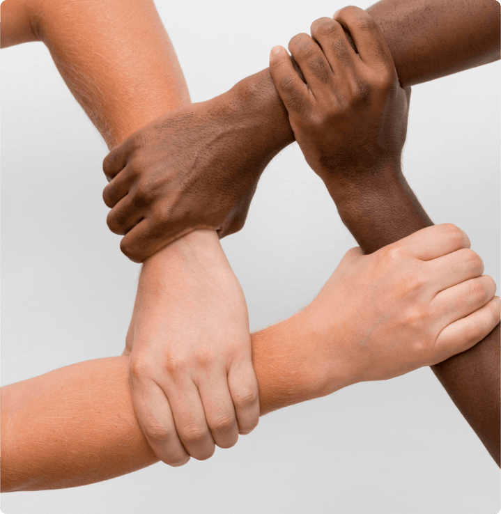 Hands coming together in unity